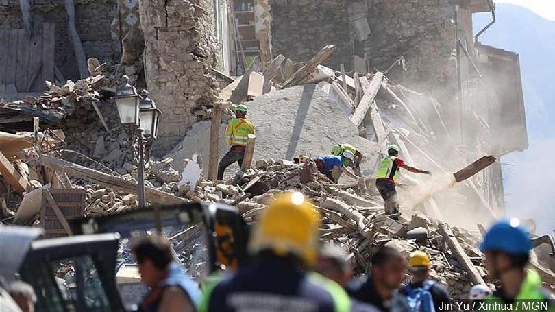 Emergency services and volunteers dig through the rubble for survivors in Amatrice central Italy Aug. 24 2016