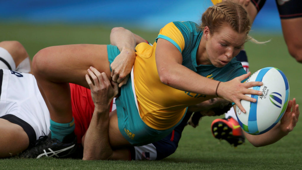 2016 Rio Olympics- Rugby- Preliminary- Women's Pool A Australia v USA- Deodoro Stadium- Rio de Janeiro Brazil- 07/08/2016. Emma Tonegato of Australia scores as she is tackled by Carmen Farmer of USA. REUTERS  Alessandro Bianchi