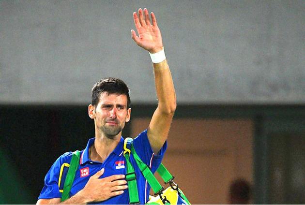 End of a dream:A tearful Novak Djokovic waves to the crowd after losing to Argentina's Juan Martin del Potro