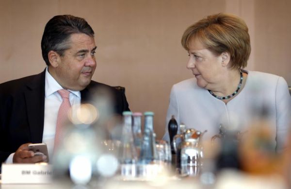 Germany's Chancellor Angela Merkel right and Vice Chancellor Sigmar