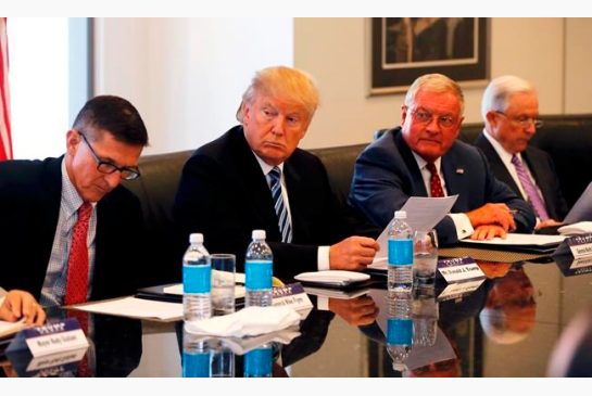 Republican presidential candidate Donald Trump participates in a roundtable discussion on national security in his offices in Trump Tower in New York Wednesday Aug. 17 2016. From left are Ret. Army Gen. Mike Flynn Trump Ret. Army Lt. Gen. Keith Kel