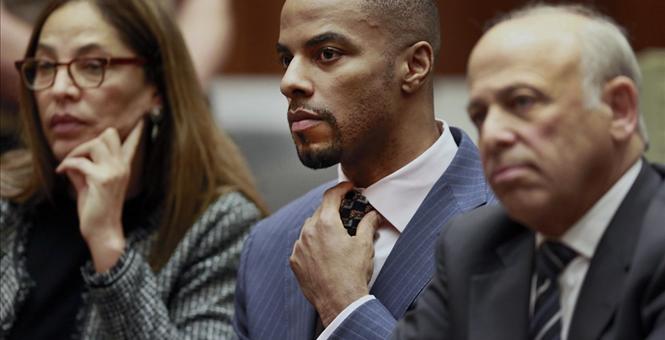 Ex-NFL star Darren Sharper arrives in court for sentencing