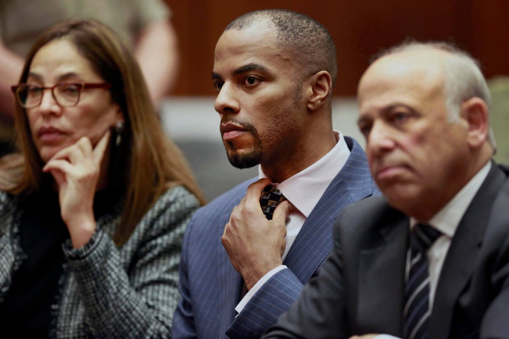 Ex-NFL star Darren Sharper arrives in court for sentencing