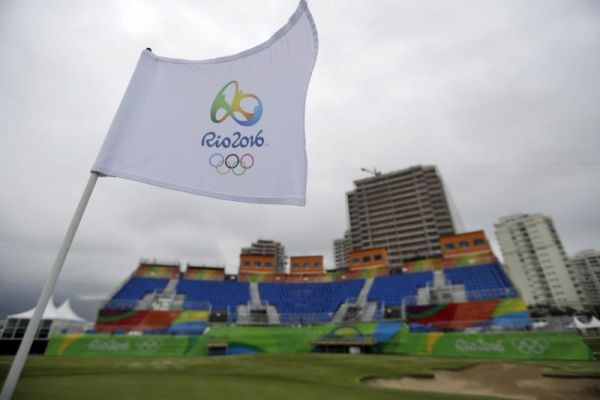 The flag on the 18th hole waves