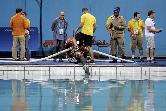 From green pool to missing pontoon, Rio's problems won't go away