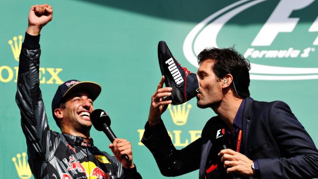 Sparkling success Mark Webber drinks champagne from Daniel Ricciardo's racing shoe after the Australian driver's