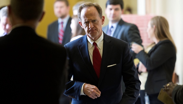 Toomey walks through the Capitol