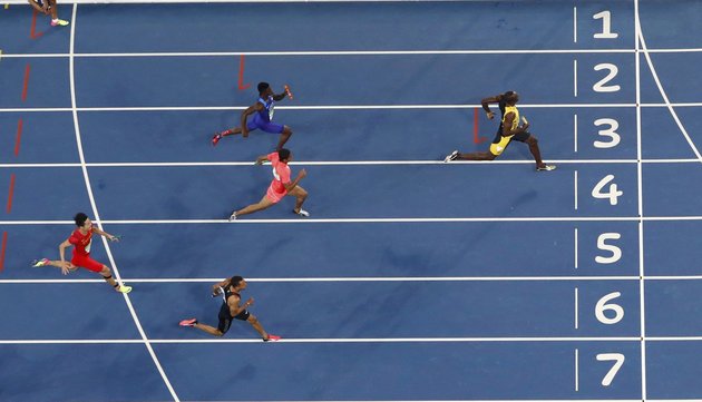 Fabrizio Bensch  Reuters
Usain Bolt races toward the finish line to win the gold