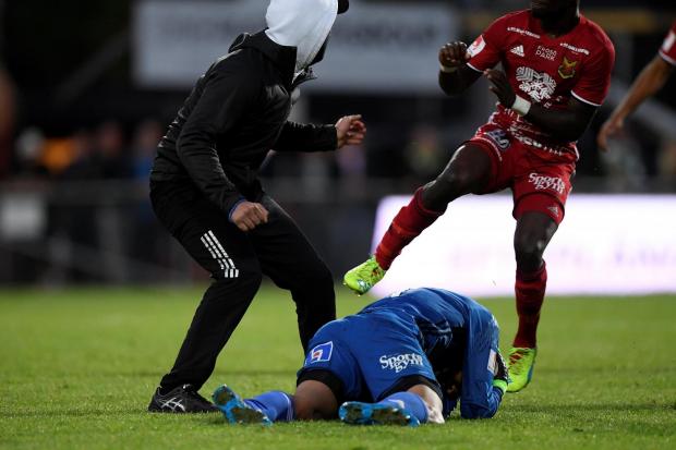 Swedish match abandoned after goalkeeper attacked by pitch invader