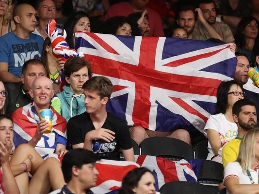 Fans holding the flag of Great britain at the Rio Olympics