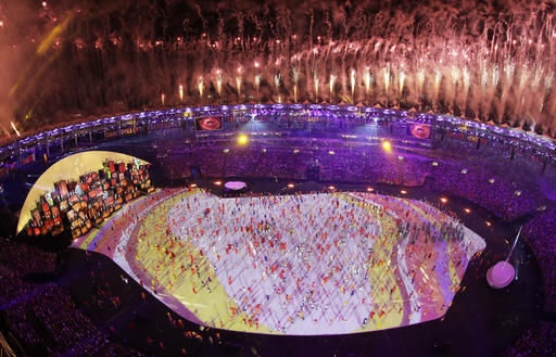 The Latest Bach applauds and waves as Germans enter stadium