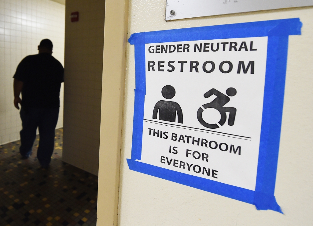 Signs are posted outside Santee High School's gender neutral restrooms at its campus in Los Angeles on May 4