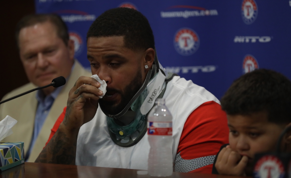 ARLINGTON TX- AUGUST 10 Prince Fielder #84 of the Texas Rangers talks with the media after doctors recommended Fielder to end his baseball playing career