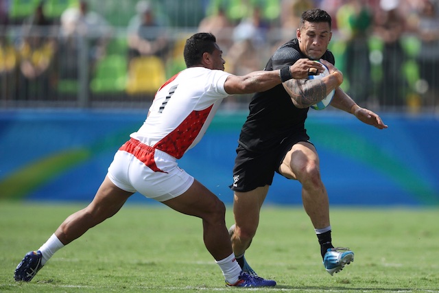 Sonny Bill Williams of New Zealand is tackled by Lomano Lava Lemeki of Japan. Reuters