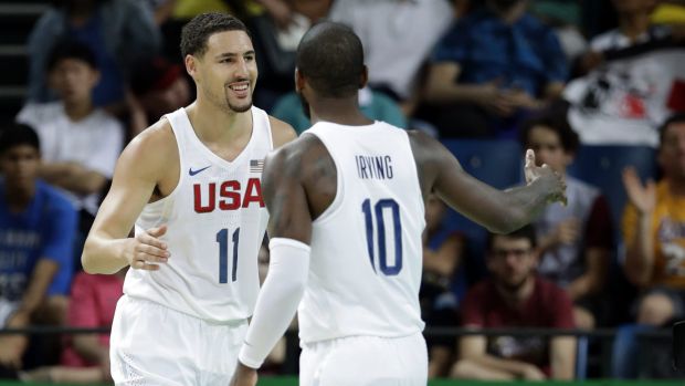 Finding his range Klay Thompson celebrates with US teammate Kyrie Irving