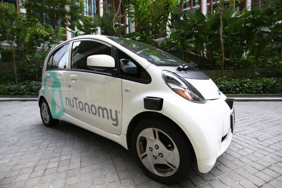 An autonomous vehicle is parked for its test drive in Singapore Wednesday Aug. 24 2016. The world’s first self-driving taxis operated by nuTonomy an autonomous vehicle software startup will be picking up passengers in Singapore starting Thursday A