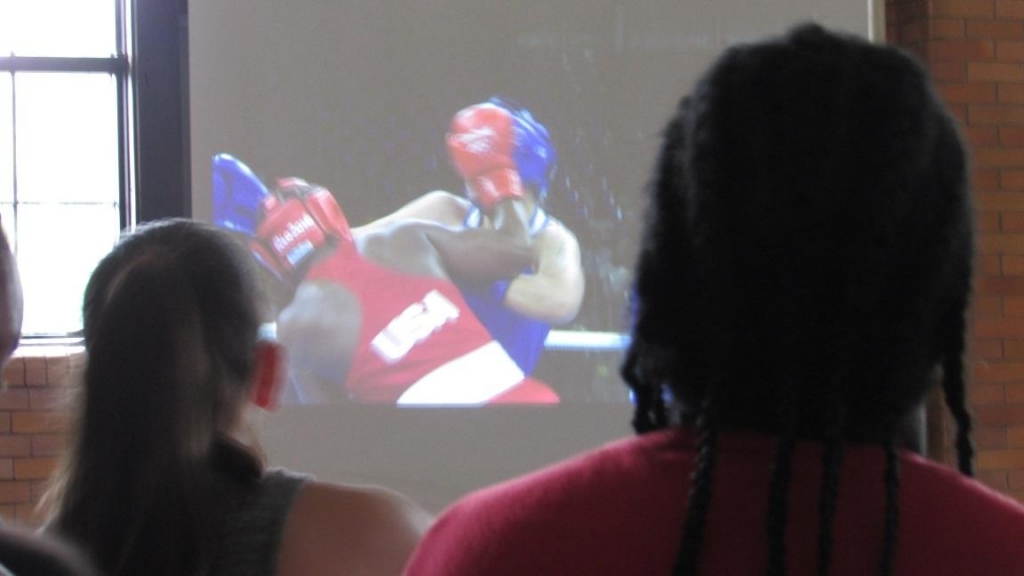 Flint residents paused today to watch local boxer Claressa Shields take to the ring at the Rio Olympics