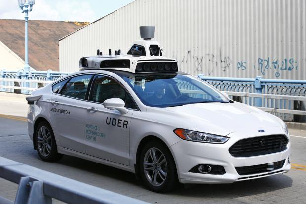 Ford reveals driverless taxi plan