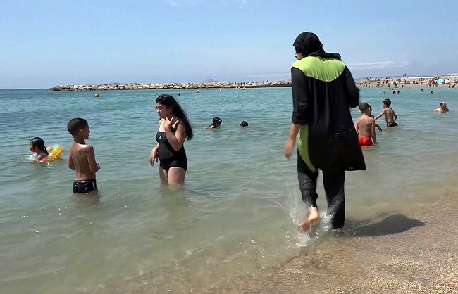 Burqinis banned from Cannes beaches for showing 'allegiance to terrorists' – French official