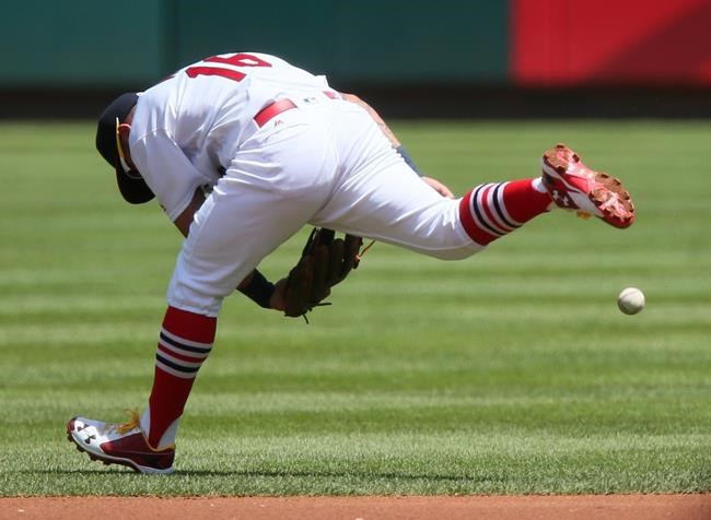 St. Louis Cardinals second baseman Kolten Wong is unable to reach a two-run single hit up the middle by Atlanta Braves&#39 Nick Markakis in the first inning of a baseball game against the Atlanta Braves on Sunday Aug. 7 2016 in St. Louis. (Chris Lee  S