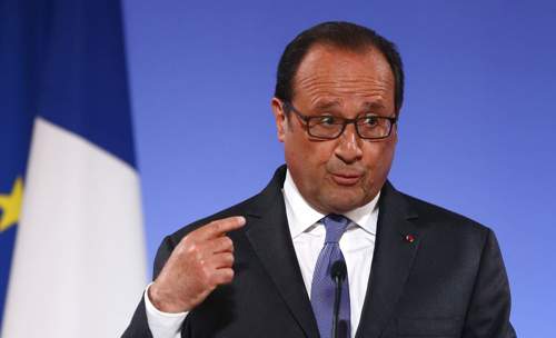 French President François Hollande gestures as he addresses French ambassadors in Paris on Aug. 30 2016. /AP