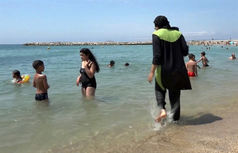 France defends burkini ban on tense post-attack beaches