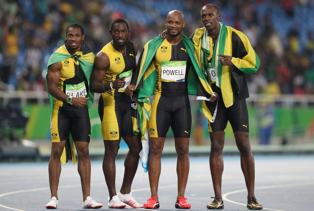 From left Yohan Blake Nickel Ashmeade Asafa Powell and Usain Bolt celebrate winning gold in the men’s