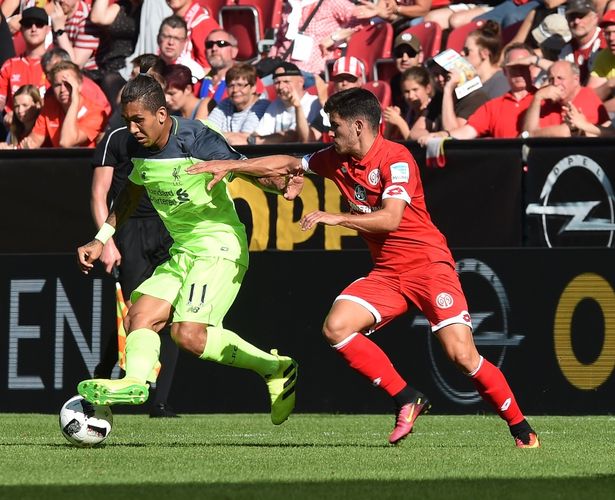 Roberto Firmino of Liverpool with Jairo Samperio of Mainz