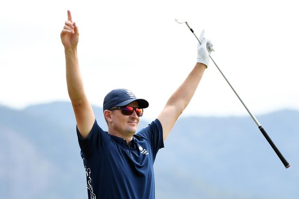 Justin Rose of Great Britain celebrates during the first round of men's golf