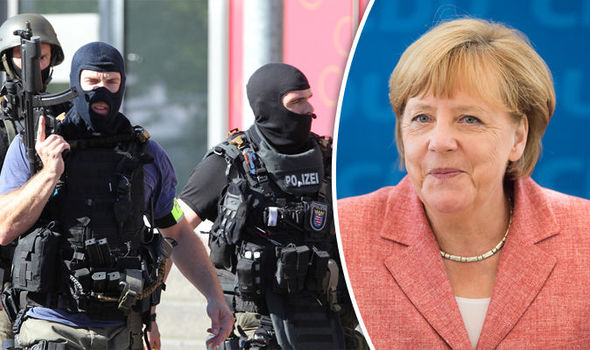 Armed police  Angela Merkel