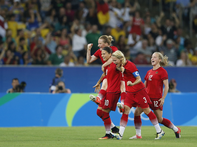 Germany's Dzsenifer Marozsan celebrates with her teammates scoring hers side's first goal during the final of the women's Olympic football tournament