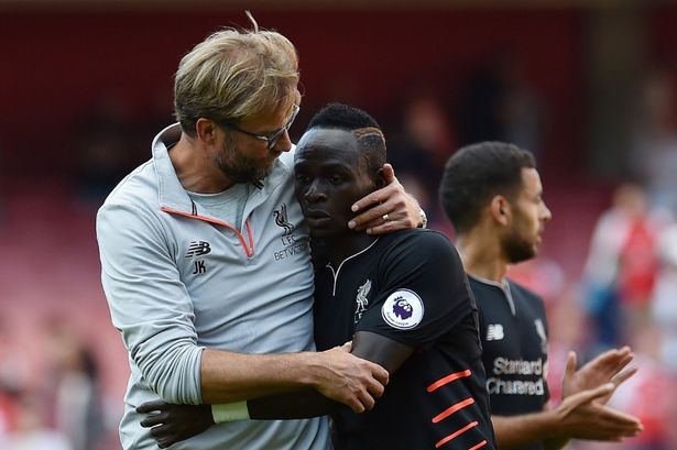 2016 Getty Images

Delight Klopp and Mane embrace after the final whistle