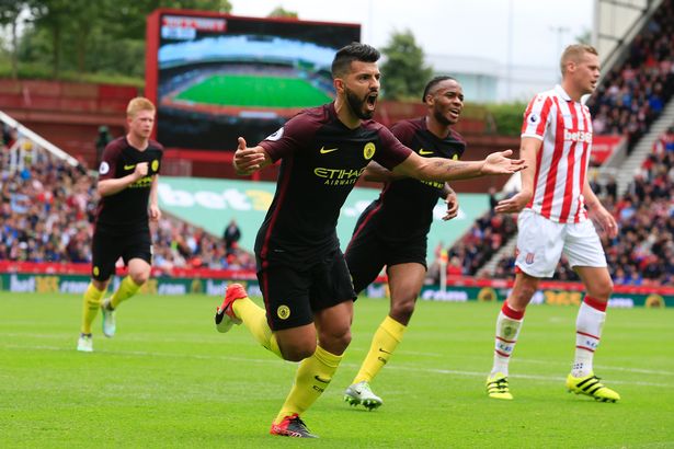 Sergio Aguero celebrates after scoring the opening goal from the penalty spot