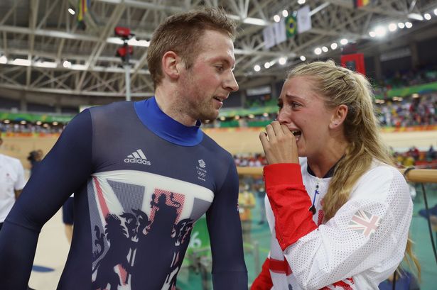 Gold medalist Jason Kenny celebrates with Laura Trott after the Men's Keirin Finals