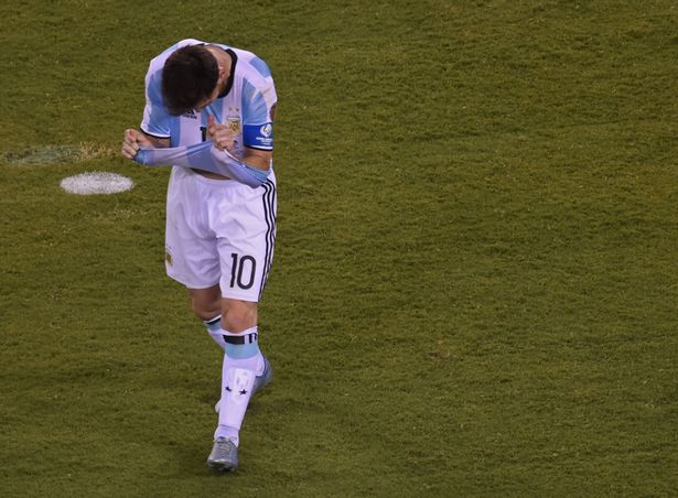 Argentina's Lionel Messi walks back to the halfway line after missing his penalty