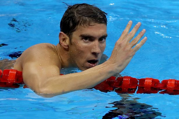 Michael Phelps celebrates winning the Men's 200m Individual Medley Final