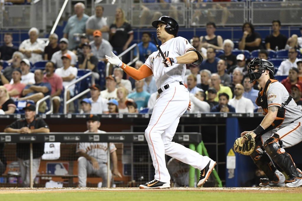 Giancarlo Stanton #27 of the Miami Marlins hits an RBI double during the 1st inning against the San Francisco Giants at Marlins Park