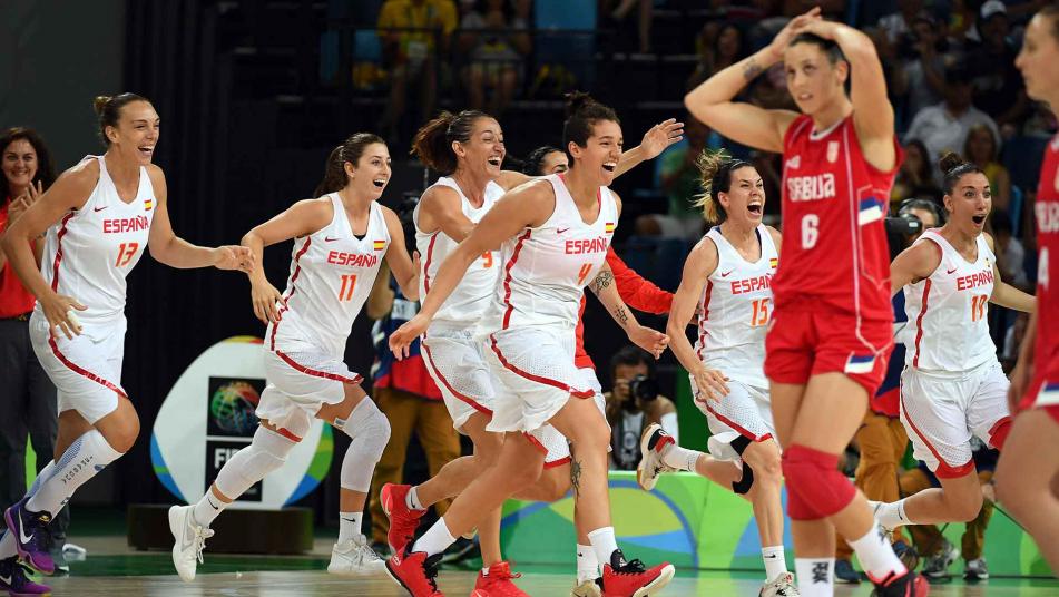 Spain celebrates after beating Serbia