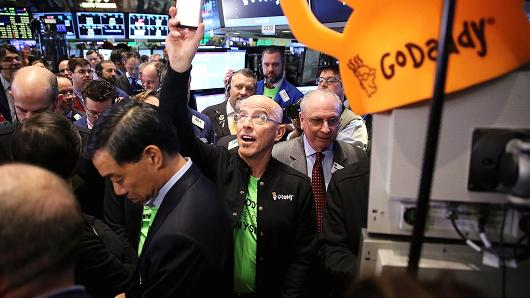 GoDaddy CEO Blake Irving visits on the floor of the New York Stock Exchange as the website hosting service makes its initial public offering