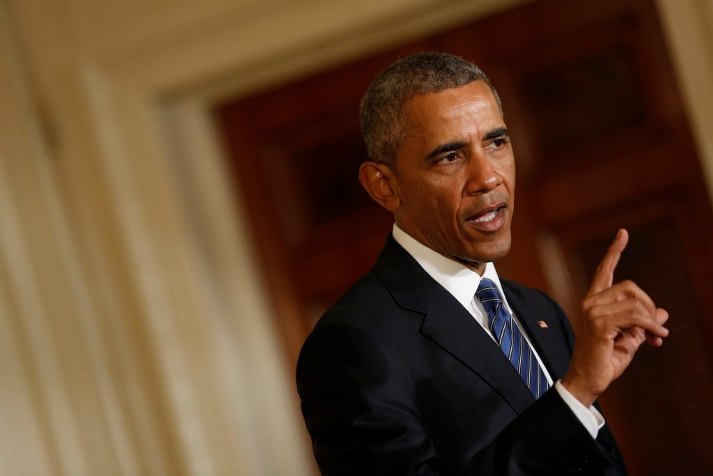 President Barack Obama answers a question as he and Singapore's Prime Minister Lee Hsien Loong hold a joint news conference at the White House August 2