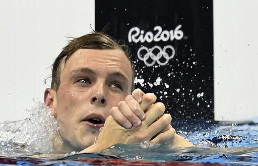 Australia's Kyle Chalmers celebrates after winning the gold medal in the men's 100-meter freestyle final during the swimming competitions at the 2016 Summer Olympics Wednesday Aug. 10 2016 in Rio de Janeiro Brazil