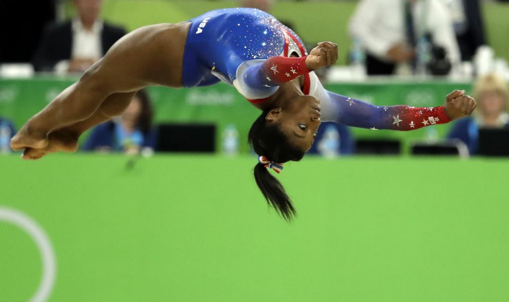 Simone Biles and Her Chicago-Raised Coach Form Legendary Bond