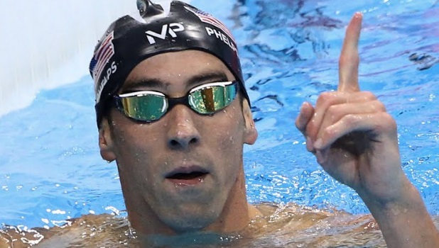 Singapore's Joseph Schooling celebrates after winning the gold medal in the men's 100m butterfly final in Rio on Friday