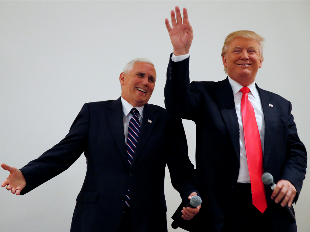 Gov. Mike Pence of Indiana and Donald Trump at a campaign event in Virginia.   REUTERS  Carlo Allegri