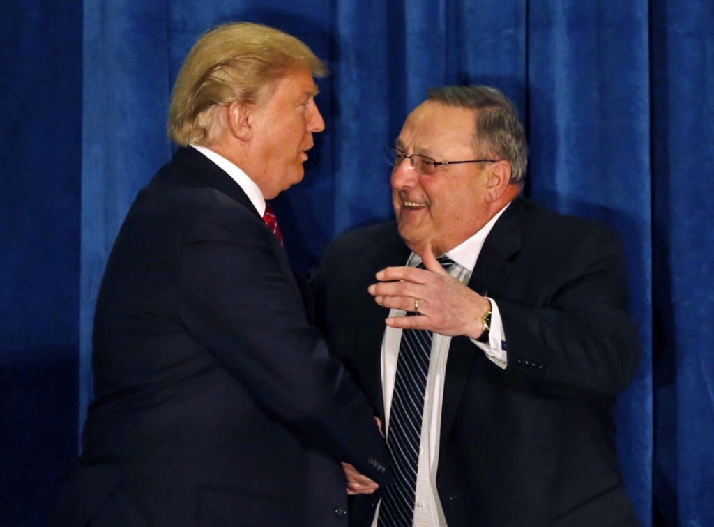 Gov. Paul Le Page shaking hands with Republican presidential nominee Donald Trump in March. CREDIT AP