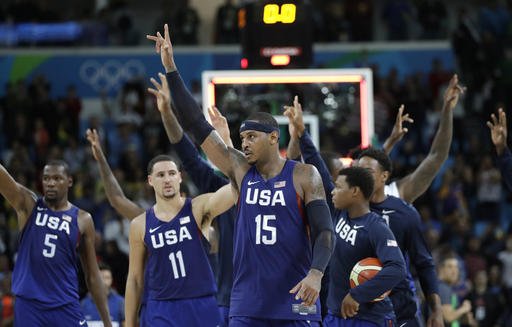 United States Carmelo Anthony and teammates walk off the court after their win over Australia in a men's basketball game at the 2016 Summer Olympics in Rio de Janeiro Brazil Wednesday Aug. 10 2016