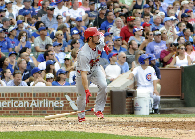 St. Louis Cardinals Randal Grichuk watches his grand slam go into the bleachers during the eighth inning of a baseball game against the Chicago Cubs Satur