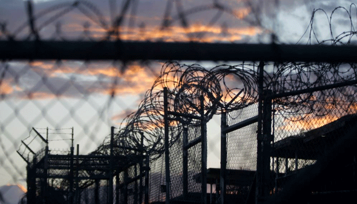 U.S. military dawn arrives at the now closed Camp X-Ray which was used as the first detention facility for militants after the 9/11 attacks at Guantanamo Bay Cuba