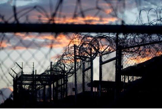 U.S. military dawn arrives at the now closed Camp X-Ray which was used as the first detention facility for al Qaida and Taliban militants who were captured after the Sept. 11 attacks at the Guanta