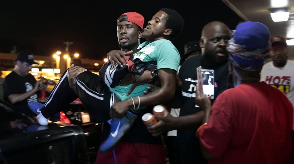 Gun fire rings out at demonstration in Ferguson